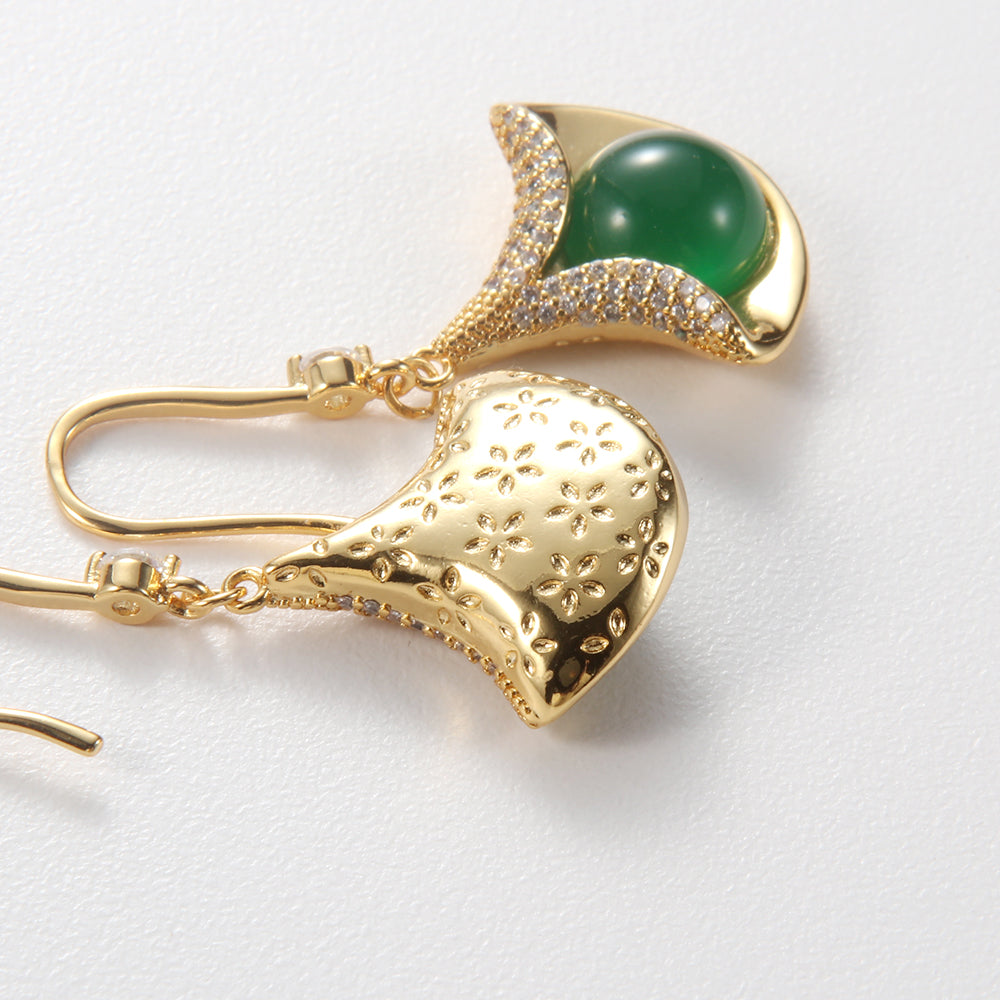 Close-up of Aveera designer ginkgo green gem earring showing intricate back texture, gold plating, and micro-pave setting.