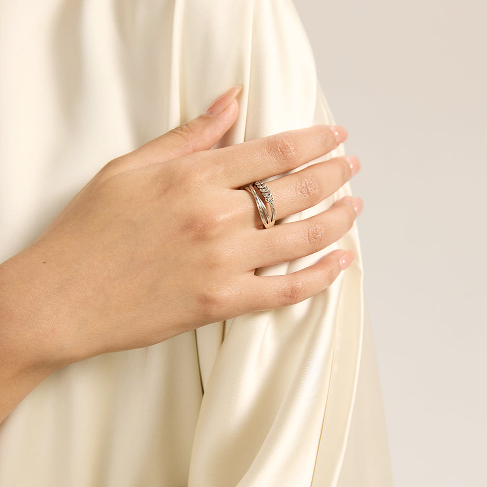 Model wearing Aveera designer gold plated heart mother-of-pearl wrap ring, demonstrating its versatile fashion appeal.