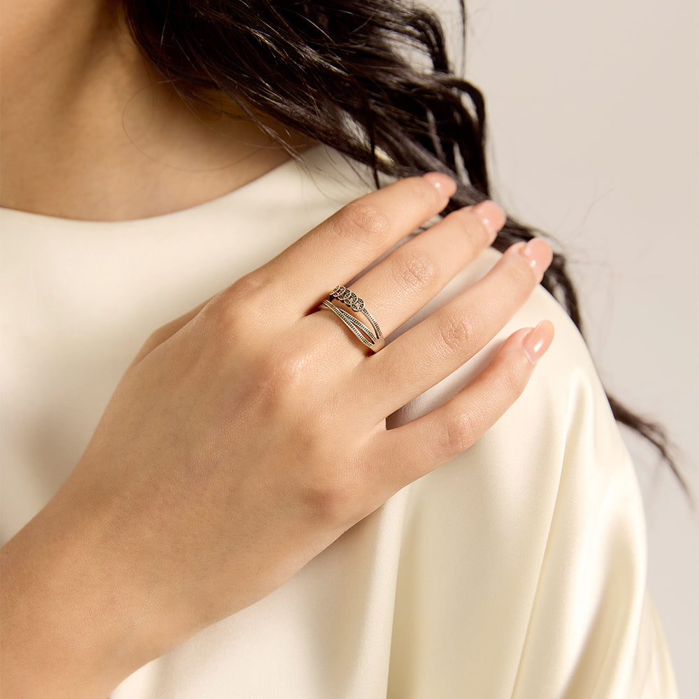 Model wearing Aveera designer gold plated heart mother-of-pearl wrap ring, showcasing its fit and style.