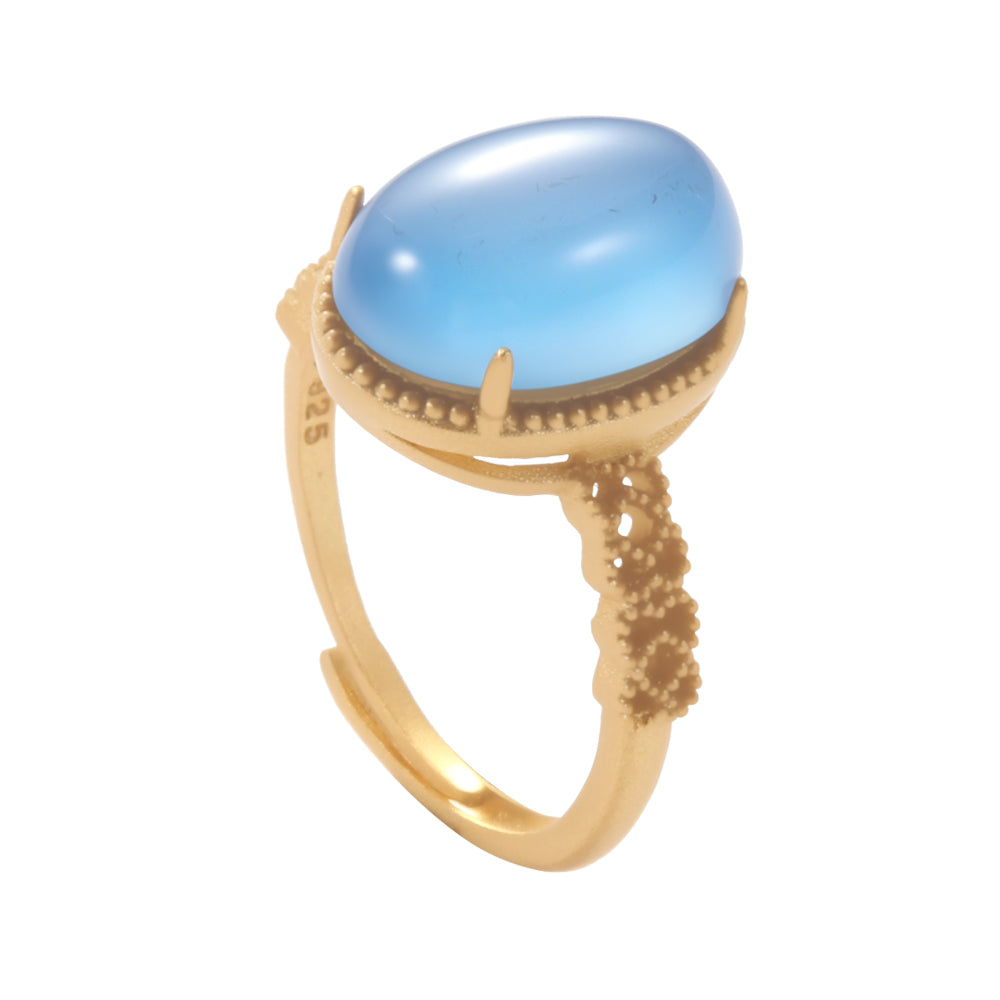 Aveera unique designer gold tone ring with three minimalist circular accents, including a blue stone, modern style.