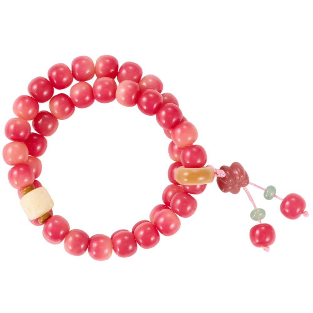 Elegant blush red beaded bracelet with unique ombre-effect dangle charm and jade accent beads.