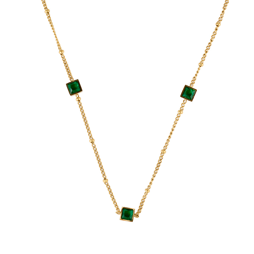 Dainty gold tone chain necklace with multiple square green gemstones, elegant everyday jewelry.