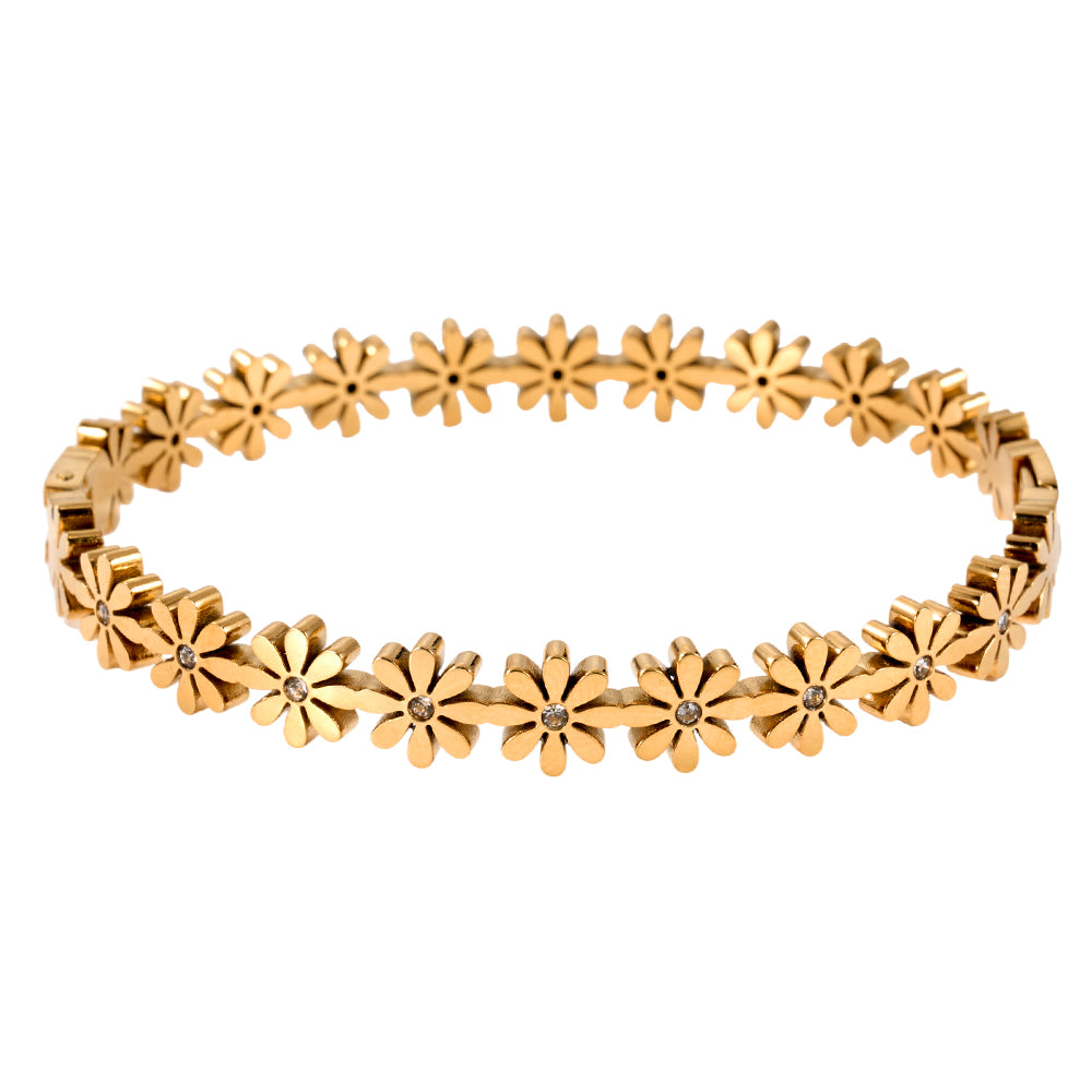 Close-up view of gold daisy chain bracelet with sparkle accents, elegant floral women's jewelry.