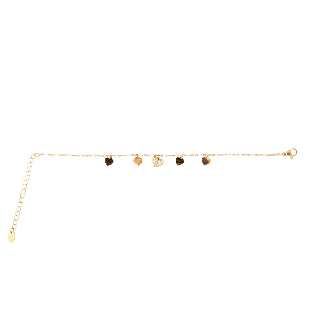 Delicate gold tone heart charm bracelet with sparkling CZ and pearl accents.