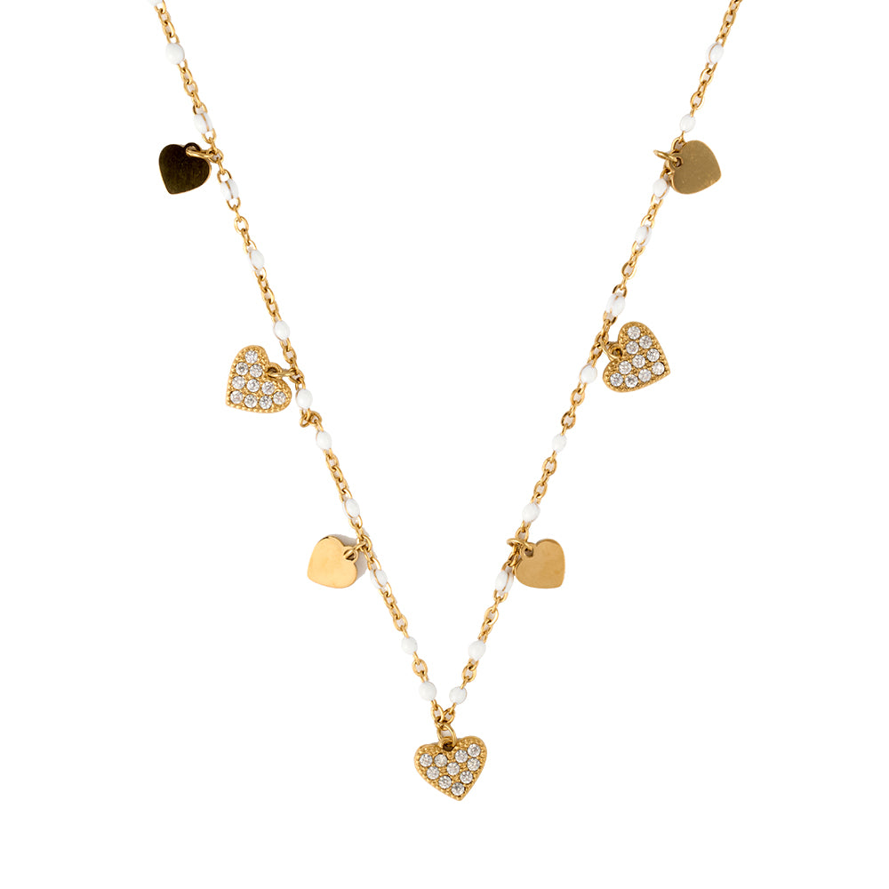 Dainty gold tone necklace with multiple dangling heart charms (plain & CZ) and white pearl accents.