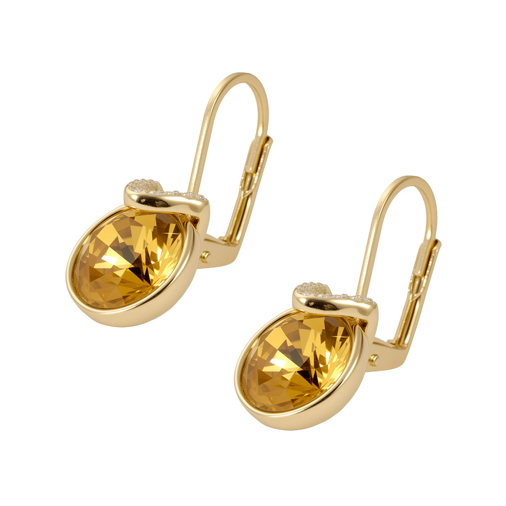 Pair of gold tone amber/yellow-brown gemstone stud earrings with a dainty beaded design on white background.