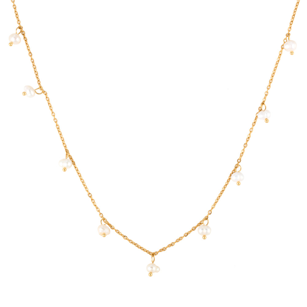 Elegant gold tone dainty chain necklace with freshwater pearls on white background.