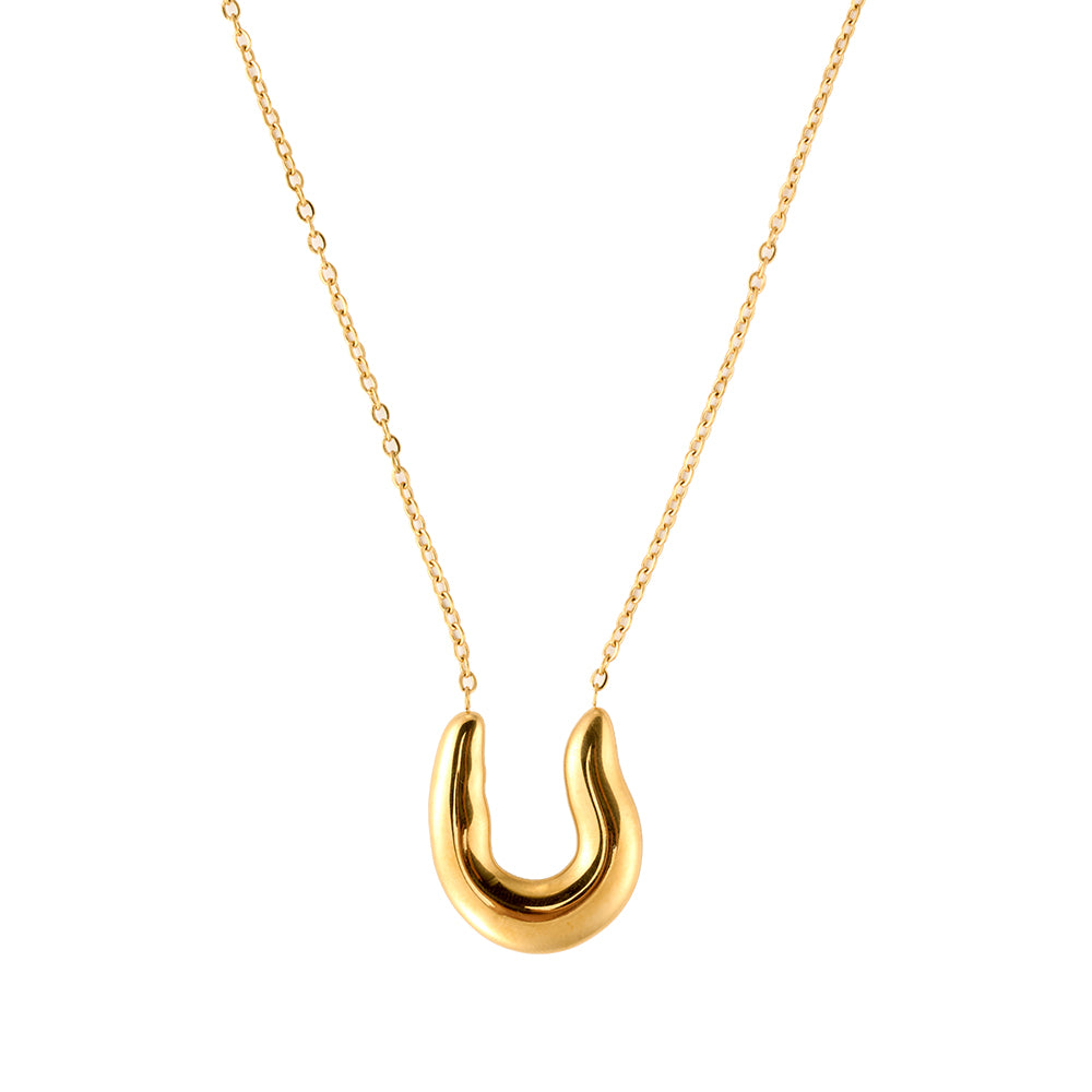 Modern gold tone polished U-shape pendant necklace on white background, minimalist everyday jewelry.